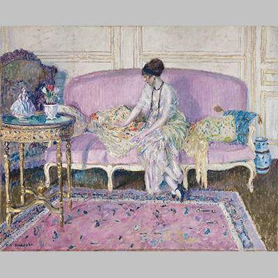 Frederick Carl Frieseke Woman Seated on Sofa in Interior